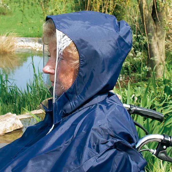 Preview: Regencape aus leichtem wasserdichtem blauen Nylonstoff - Mit Kapuze