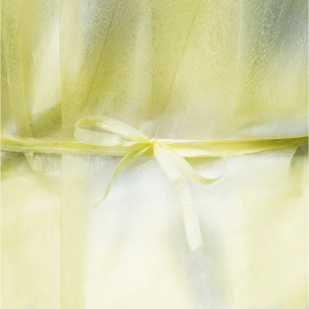 AMPRI Med-Comfort Vlieskittel mit PE-Beschichtung - Größe L/XL, gelb, mit Trikotbündchen