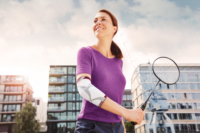 Actimove EpiMotion Ellenbogenbandage - weiß/grau/rot